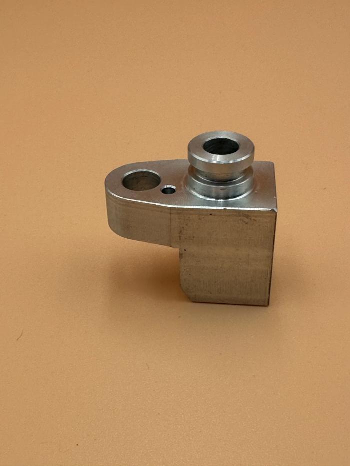 What is the current status of the development of precision parts processing technology